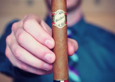 Man Hand Holding Brick House Double Connecticut Cigar