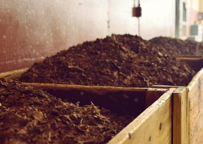 Two Barrels side my side of loose filler tobacco