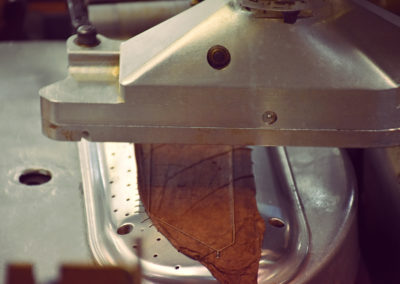 Close Up of Cigar Rolling Machine Wrapper Plate