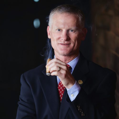 Scott Lewis Holding Diamond Crown President of Finance J.C. Newman.