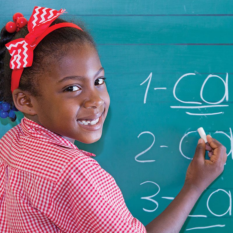 Cigar Family Charitable Foundation Student Math on Chalkboard