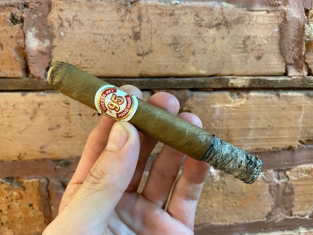 cr95second third cuestarey cigar in brick one third smoked