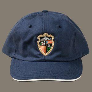the american hat in navy blue with the american shield logo embroidered on the front