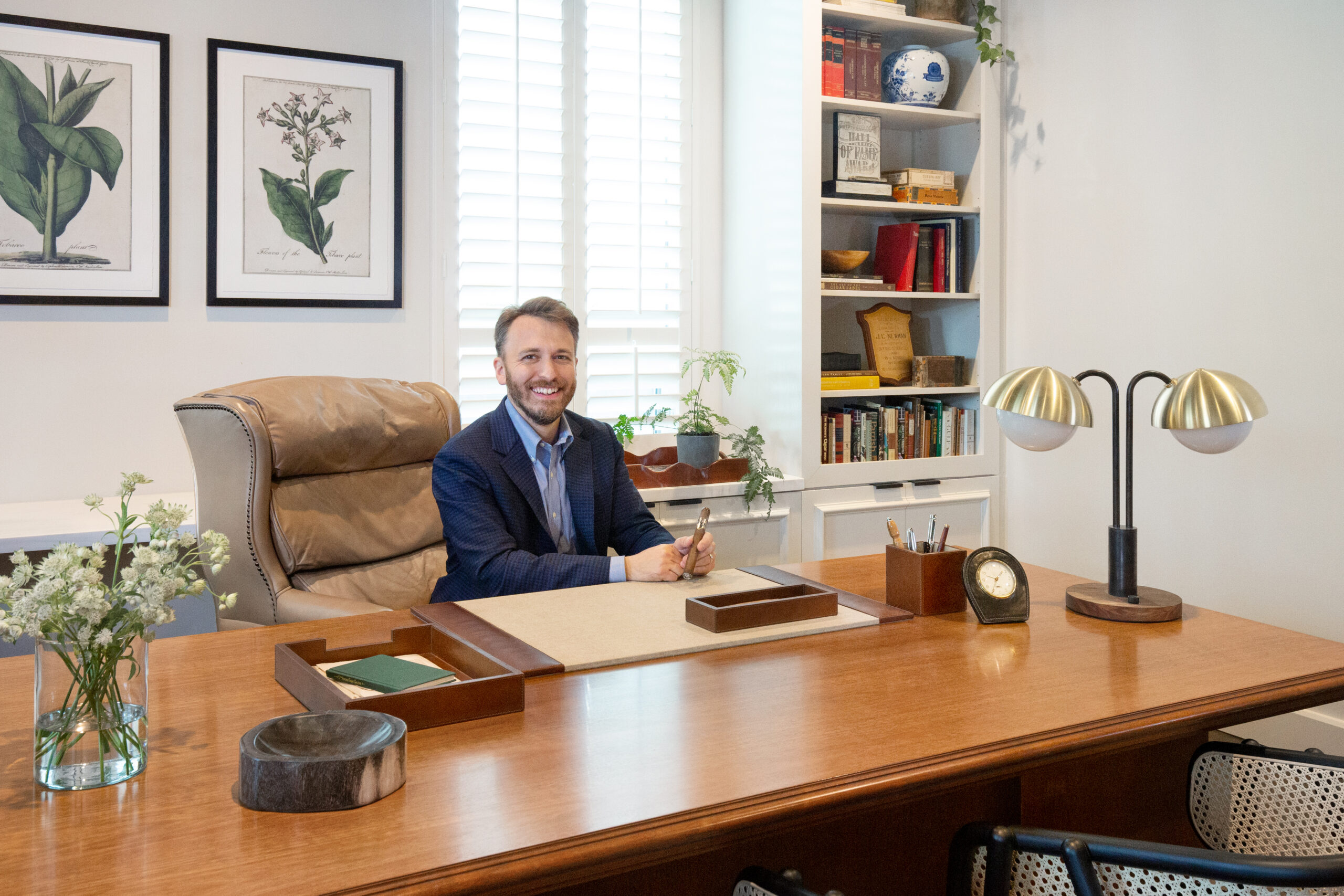 Drew Newman at his desk
